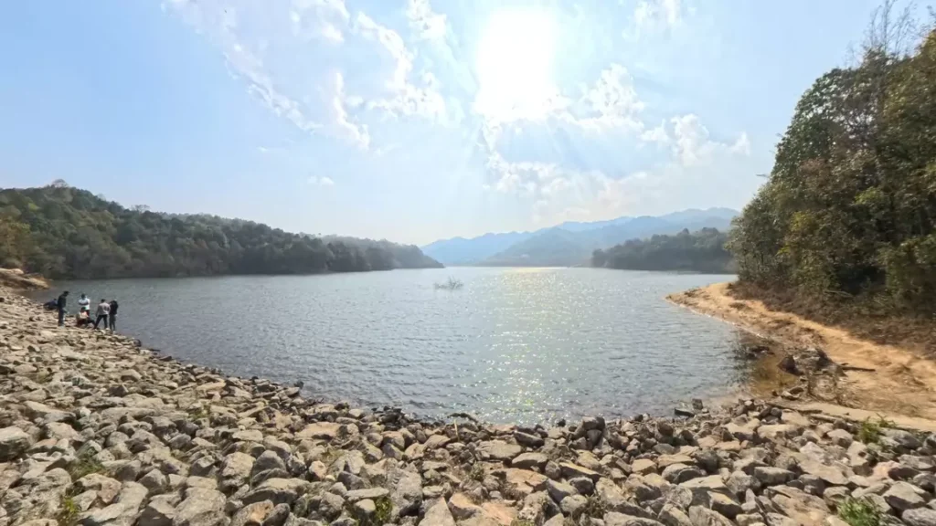 View of Dhap Dam with calm water reflecting the natural beauty