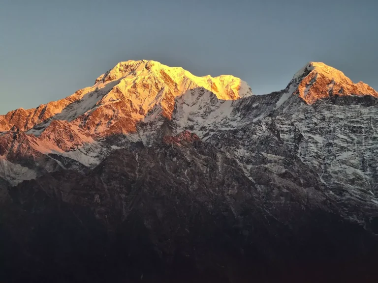 Golden sun rays touching Annapurna South and Hiunchuli