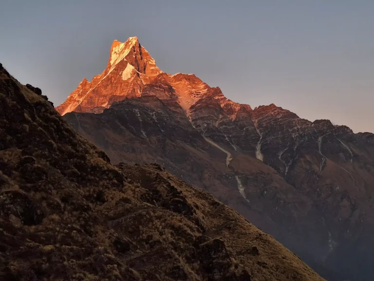 Golden sunlight shining over Machhapuchhre and Mardi Himal