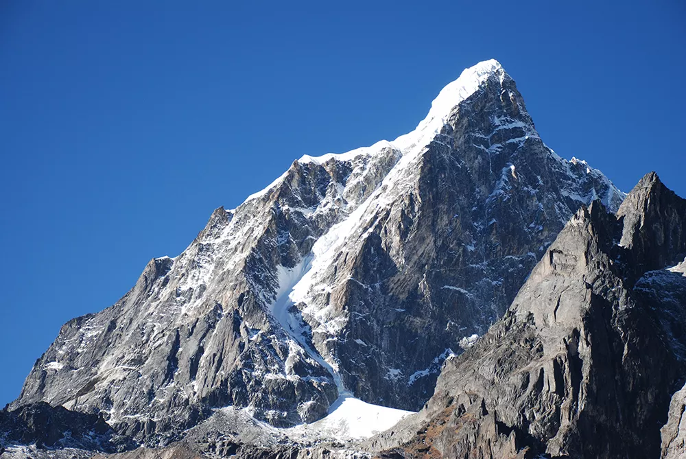 Dramatic Taboche peak with glacier-covered rugged slopes.